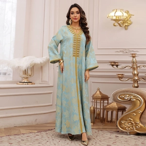 Elegant light blue kaftan dress with gold floral embroidery and sequin details