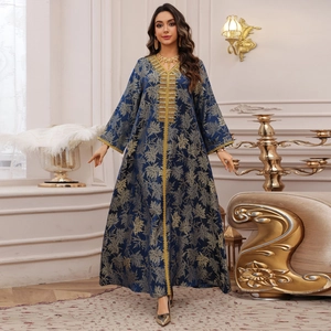 Elegant navy blue kaftan with gold embroidery and palm leaf patterns for summer 2025