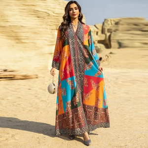 Bohemian printed kaftan maxi dress with geometric patterns and floral motifs for resort wear