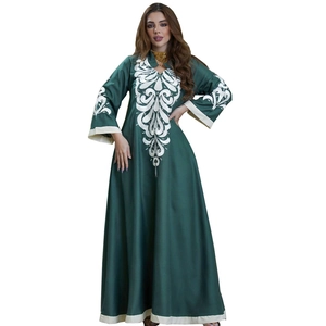 Dark green embroidered kaftan dress with white scrolls pattern and long loose sleeves