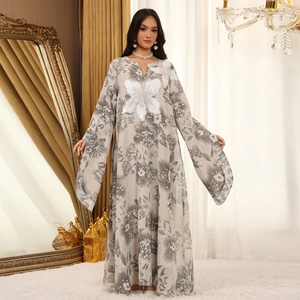 Elegant grey floral maxi dress with butterfly sequin embroidery and long flared sleeves