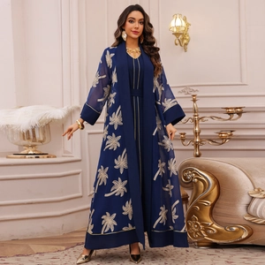Elegant navy blue two-piece abaya set with gold coconut tree embroidery and inner dress