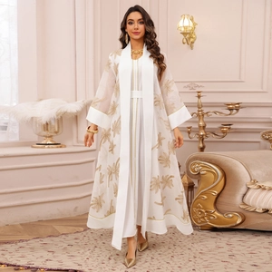 Elegant white two-piece abaya set with gold palm tree embroidery and sheer cardigan