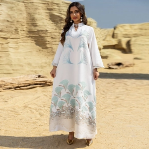 Elegant white long sleeve abaya dress with blue floral embroidery and high neck detail