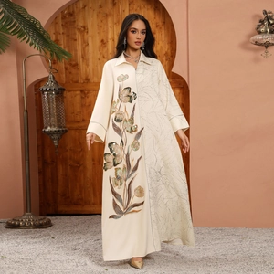 Elegant cream kaftan with sequined floral embroidery and leafy pattern detail