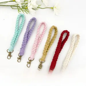 Detail of handcrafted woven cotton lanyards in six colors with bronze lobster clasps