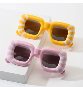 Detailed view of square chunky sunglasses with striped patterns on colorful frames