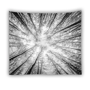 Detail showing the black and white forest print and texture of the hanging tapestry