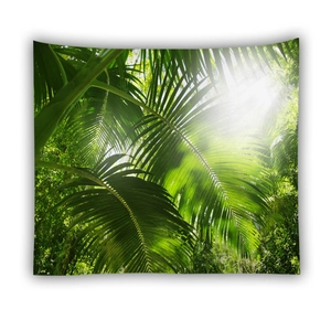 Detailed close-up of tropical rainforest tapestry with lush green palm leaves and sunlight