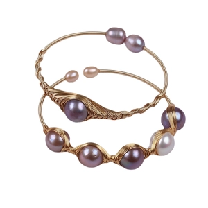 Handcrafted 14K gold filled freshwater pearl bracelet with adjustable woven design
