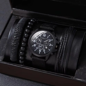 Detailed view of black quartz watch with canvas strap and four matching beaded bracelets