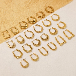 Variety set of geometric stainless steel hoop earrings with gold finish and textured design