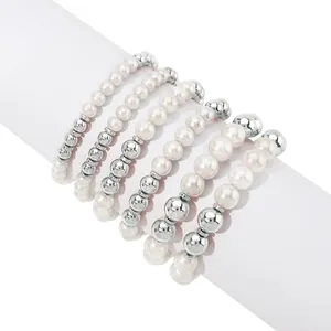 Set of 6 layered pearl and silver bead elastic bracelets with minimalist French style