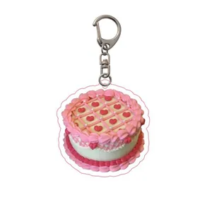 Vintage 90s style cute pink acrylic birthday cake keychain with silver metal spring clasp