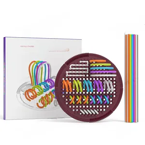 Detailed view of the purple sensory activity board with colorful silicone strings and packaging