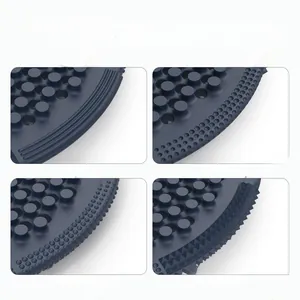 Macro view of four distinct sensory textures on the blue silicone activity board surface
