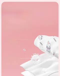 Detail of disposable bedding fabric showing triple-layer thickness and cute rabbit prints