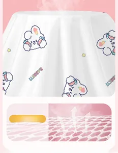 Detail of breathable white mesh fabric with blue rabbit print for disposable bedding set