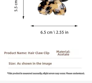 Macro view of floral cellulose acetate hair claw clip showing 6.5cm x 5.5cm dimensions