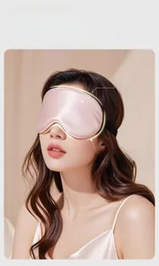 Pink silk sleep mask with wide coverage and adjustable elastic strap for comfort
