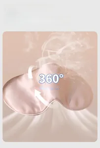 Breathable champagne pink silk sleep mask with visible smoke effect showing airflow