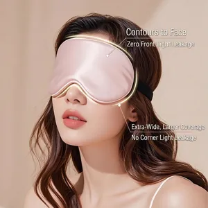 Pink silk sleep mask set with widened coverage and adjustable strap for total blackout