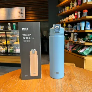 Close-up of TYESO 750ml light blue vacuum flask with handle lid and original packaging