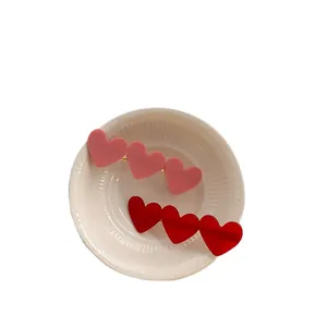 Cute acrylic heart hair clips set in pink and red colors for women's daily styling