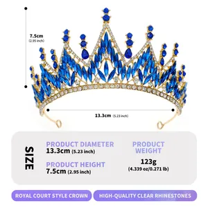 Baroque gold crown with blue marquise rhinestones and crystals on white background
