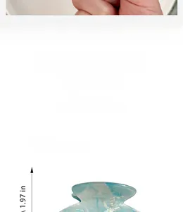 Detailed view of 31g marble pattern hair claw clip with dimensions and crystal accents