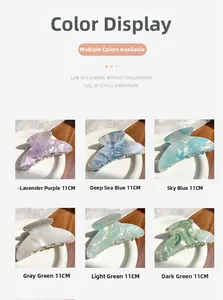 Detail showing marble texture and 11CM size of large acetate claw hair clips in 6 colors