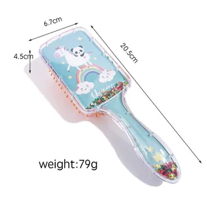 Detail view of cartoon unicorn hairbrush with glitter sequins and size dimensions