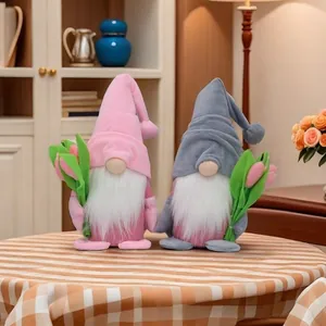 Close-up of plush tulip gnomes with white beards on a checkered tablecloth
