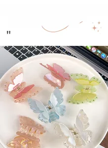 Macro shot of 6-piece colorful acrylic butterfly hair clips with tiny rhinestones