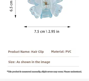 Detailed view of the 6.5x7.5cm light blue butterfly hair claw clip with crystal accents