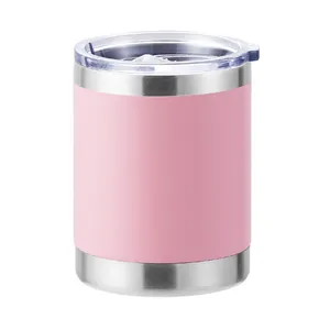 Detailed close-up of matte pink finish and brushed stainless steel rim on travel mug