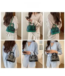 Detail showing snake pattern shell bags in green and monochrome with metallic finish