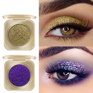 Funkelnde Glitzer-Lidschatten in Gold und Lila für Gesichts- und Körper-Festival-Make-up