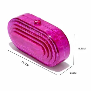 Detail view of fuchsia marble acrylic clutch bag showing 17.5cm x 6.5cm x 11.5cm dimensions