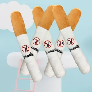 Detail showing five cigarette-shaped plush dog toys with No Smoking embroidery