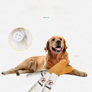 Close-up of cigarette-shaped squeaky plush toy for dogs being held by a Golden Retriever