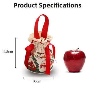 Detailed size view of Christmas drawstring bag showing 14.5x10cm dimensions with red apple