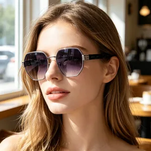 Detail of silver geometric sunglasses with purple gradient lenses on female model