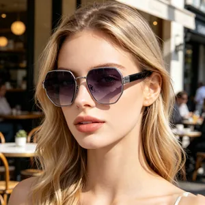 Close-up of hexagonal sunglasses with metal frames and gradient purple lenses