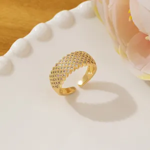 Minimalist gold adjustable ring featuring pavé micro-set diamonds in a diamond grid pattern
