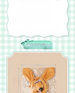 Detail view of plush kangaroo ear headband set in packaging with size dimensions