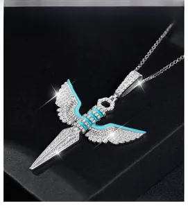 Close-up of S925 silver angel wing sword pendant with blue enamel and pavé moissanite