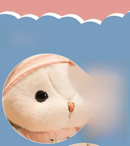 Detailed macro view of soft white plush bunny fur and pink floral embroidery details