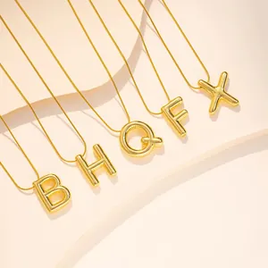 Minimalist gold 3D initial letter necklace set with polished snake chain pendants