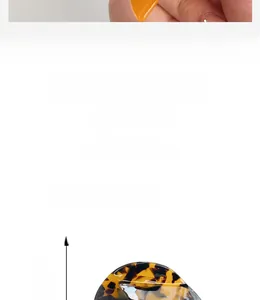 Detail view of tortoiseshell acetate hair claw clip with mosaic mini flash drill accents